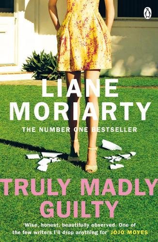 Book cover: woman in yellow dress standing on grass with torn papers around her.