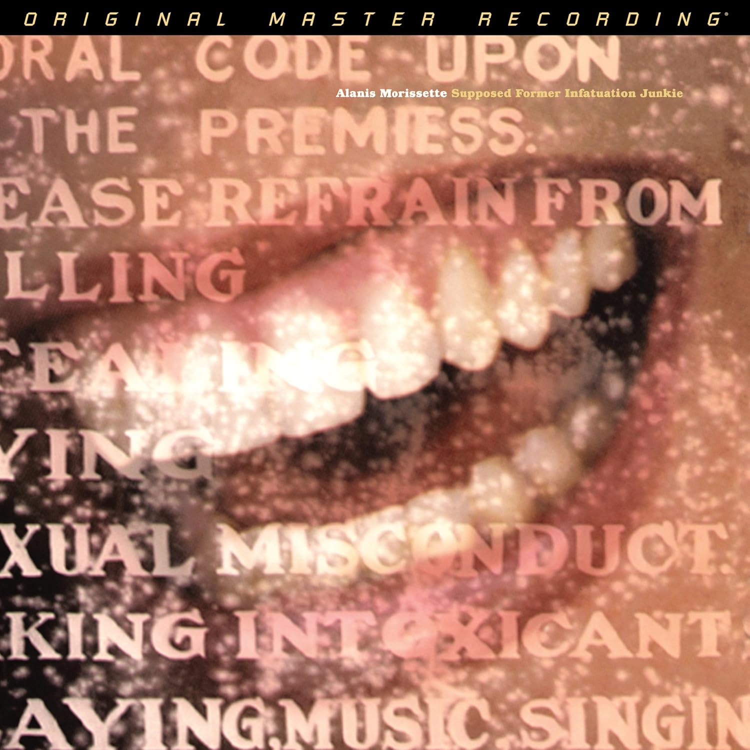 Alanis Morissette’s “Supposed Former Infatuation Junkie” vinyl record cover.