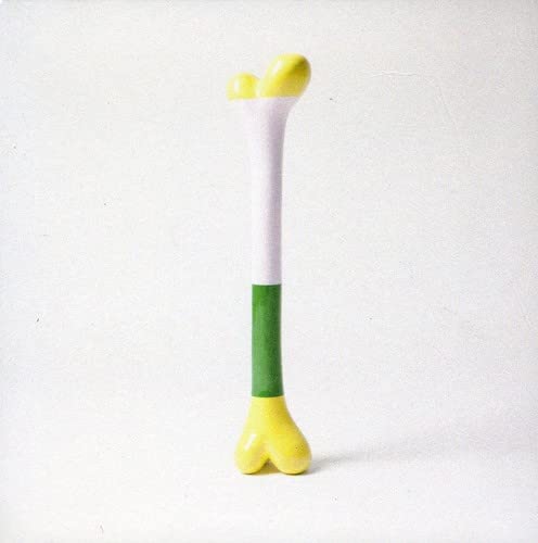 CD cover featuring a tall, abstract, bone-shaped ceramic sculpture.