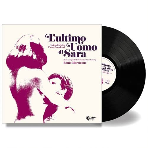 Vinyl record and cover art featuring a magenta silhouette of a couple embracing.