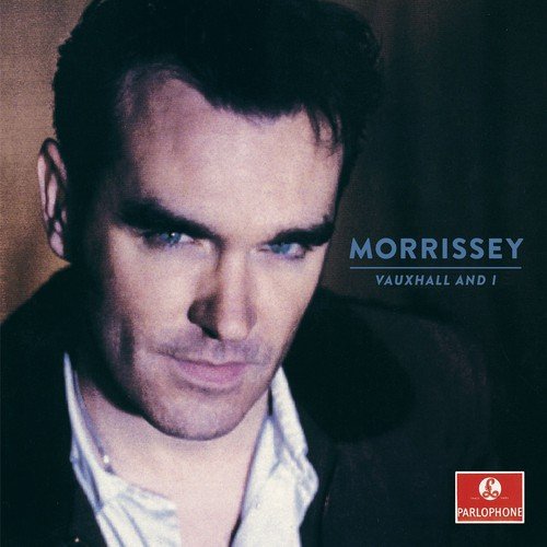 "Morrissey album cover featuring a close-up portrait of Morrissey with dark hair and blue eyes."