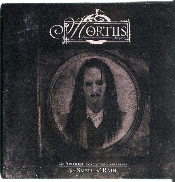 CD cover: dark portrait within ornate frame, "Mortiis" logo above.
