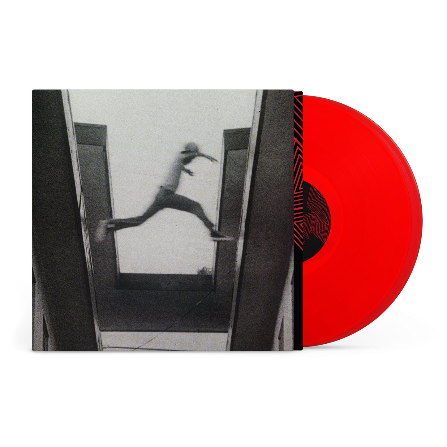Mos Def The Ecstatic album cover with a red vinyl record next to it.