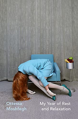 A woman in a blue dress slumped over a blue chair with fruit nearby.