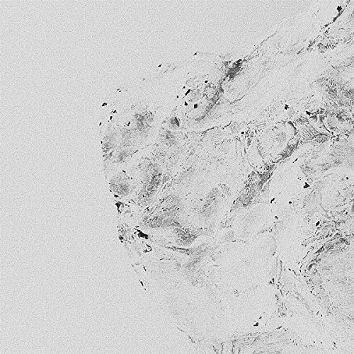 Abstract grayscale image of textured surface, possibly vinyl record cover.