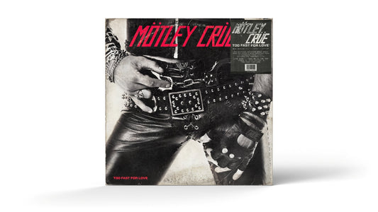 Mötley Crüe “Too Fast For Love” vinyl record cover with studded belt.