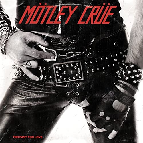 Mötley Crüe album cover: leather, studs, and a gloved hand fastening a belt.