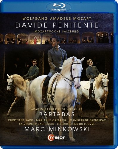 Blue-ray case cover featuring three men riding white horses in a dark stable.