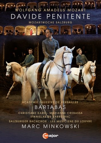 DVD cover featuring three horseback riders in a stable with spectators above.