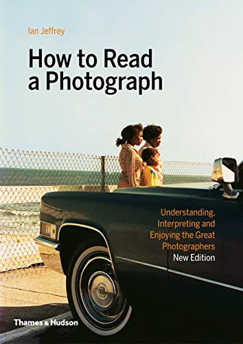 Book cover: "How to Read a Photograph" with a beach scene image.