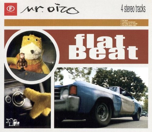 Vinyl cover art featuring a yellow puppet, a small monkey, and a blue car.