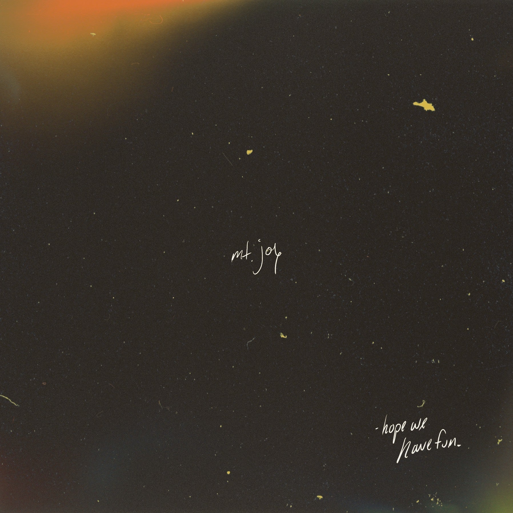 Album cover with dark, grainy texture, orange light leak, and white handwritten text.