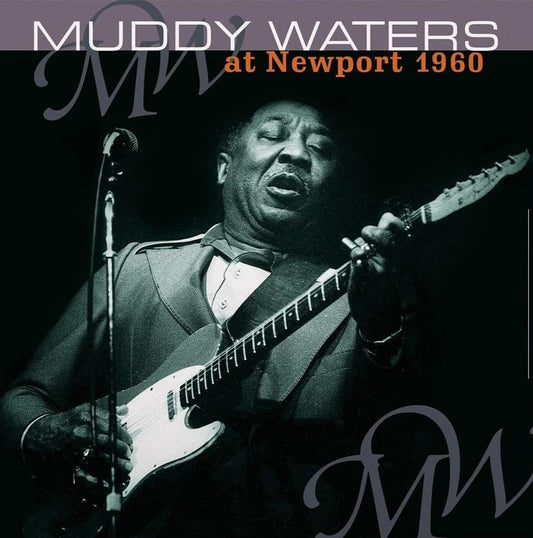 Muddy Waters playing electric guitar, album cover for “At Newport 1960”.