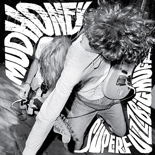 Black and white album cover featuring a guitarist mid-performance.