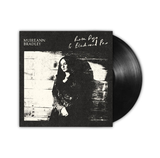 BC-high-contrast black and white photoS-portrait of a woman on a vinyl record cover.