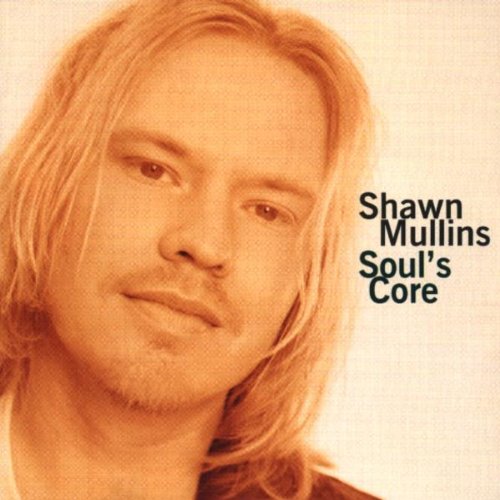 Close-up portrait of Shawn Mullins on an orange-tinted album cover for Soul's Core.