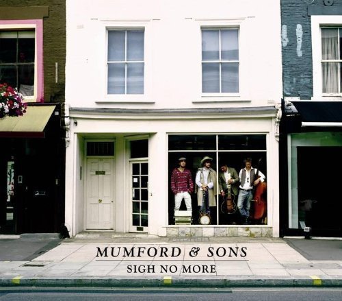 Four men standing in the window of a white building, Mumford and Sons album cover.