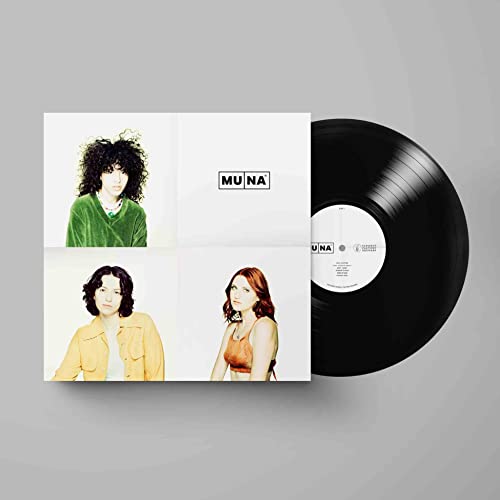 Muna album vinyl record with cover featuring portraits of three women.
