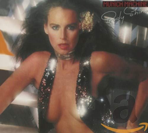 A woman with dark hair wears a sequined vest on the Body Shine album cover.