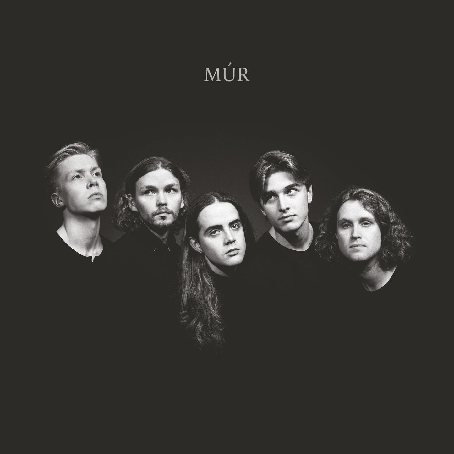 Black and white album cover featuring a band of four people.