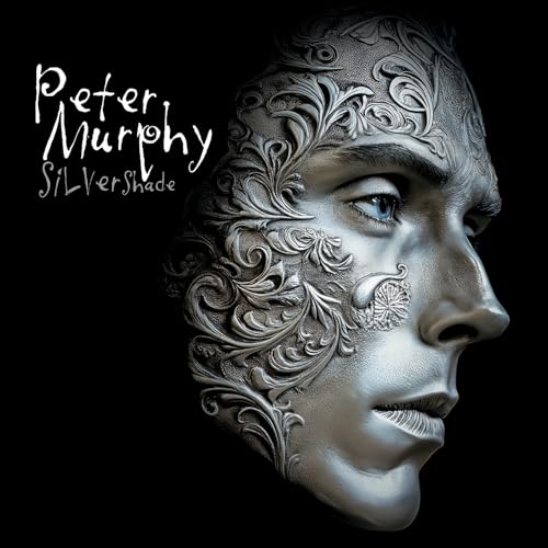 Silver-toned portrait of Peter Murphy with intricate floral designs.
