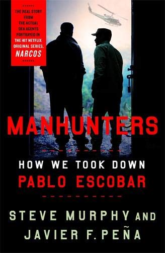 Book cover: “Manhunters” about taking down Pablo Escobar, two silhouetted men.