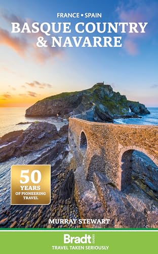 A stone bridge leads to a rocky island at sunset on a travel guide cover.