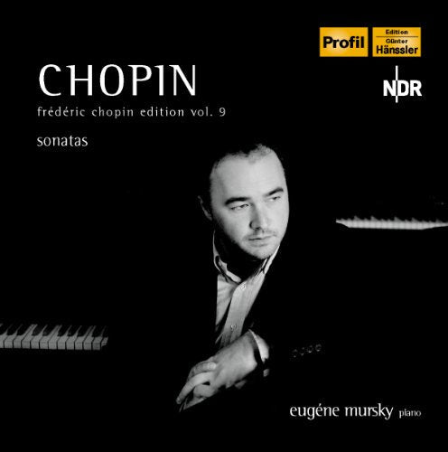 Black and white portrait of pianist Eugène Mursky with a piano.
