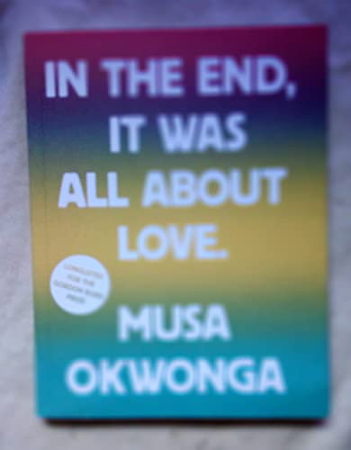 Book cover with white text on a rainbow gradient background and a circular sticker.