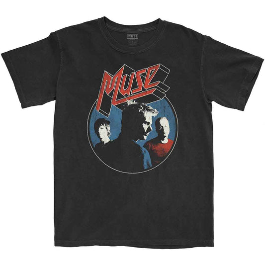 A man wearing a black t-shirt with a vintage Muse band logo and graphic.