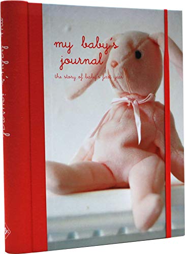 Pink baby journal with a teddy bear on the cover.