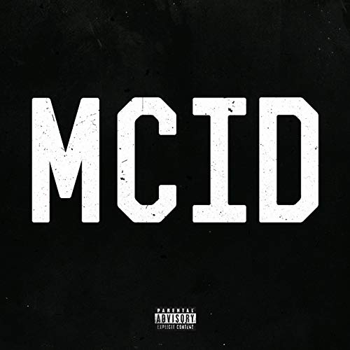 Black background with large, distressed white letters spelling "MCID".