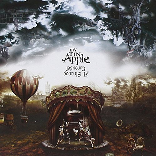 CD cover: carousel with horses, hot air balloon, cloudy sky.