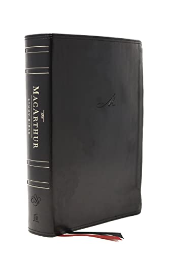 Black leathersoft Bible, closed, with red ribbon bookmark visible.