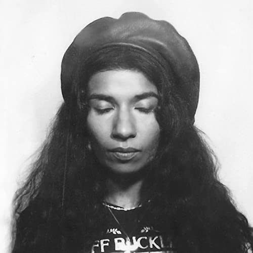 Black and white portrait of Nabihah Iqbal wearing a beret.