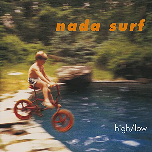 Nada Surf “High/Low” album cover: boy on a bicycle by a pool.
