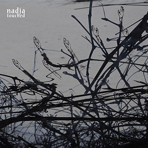 "Album cover with dark branches and buds against a gray background, 'nadja touched' in white text."