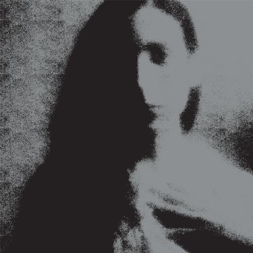 Grainy black and white portrait of two women in profile.