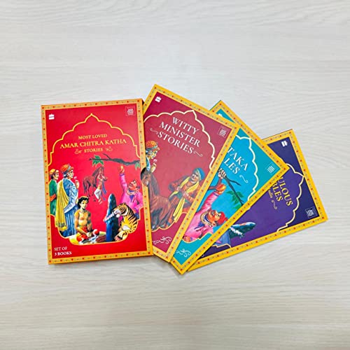 Set of three colorful Amar Chitra Katha storybooks stacked on white surface.