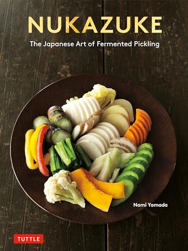 Book cover featuring a wooden plate of assorted Japanese pickled vegetables.