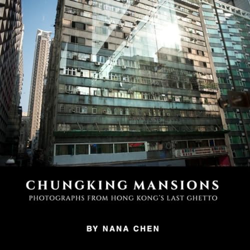Tall, weathered Chungking Mansions building in Hong Kong with many windows.