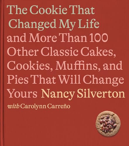 Red cookbook cover with title and a single chocolate chip cookie.