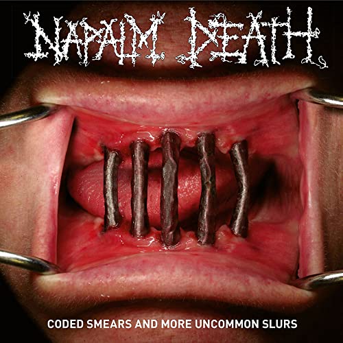Napalm Death album cover: open mouth with metal bars, red interior.