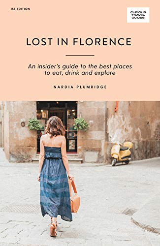 Book cover: “Lost in Florence” with a woman walking away from a building.