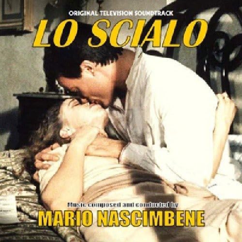 CD cover showing a man and woman kissing on a bed.SC.