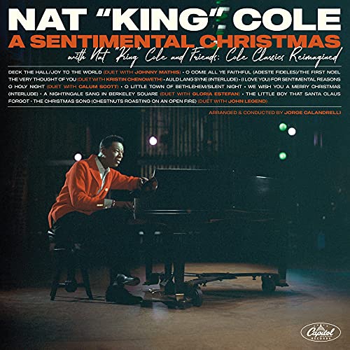 Nat King Cole album cover featuring Cole seated at a piano.