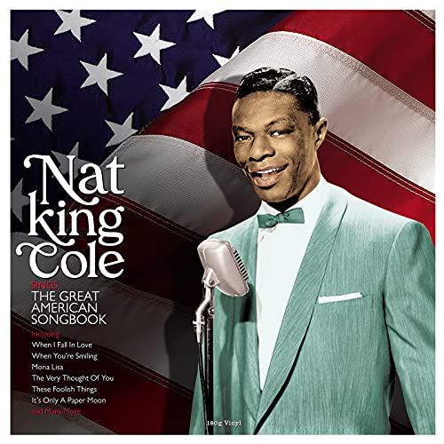 Nat King Cole portrait with American flag background, vinyl record album cover.