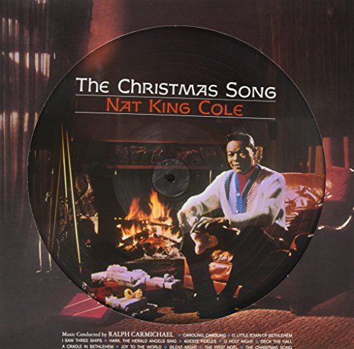 Nat King Cole’s “The Christmas Song” vinyl record with fireplace image.