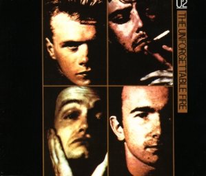 U2 The Unforgettable Fire album cover featuring four close-up portraits of the band members.