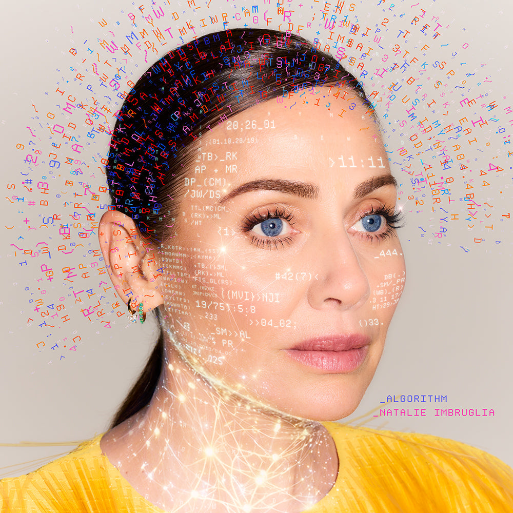 Natalie Imbruglia album cover with digital code overlay and blue eyes.